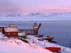 Harbor area Russian coal mining town Barentsburg at fjord Gronfjorden Norway Art Print